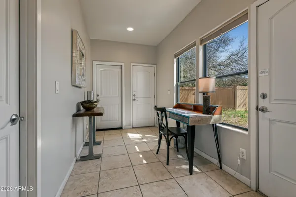 a view of storage and utility room with racks on the wall