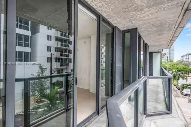 a view of a balcony with city view