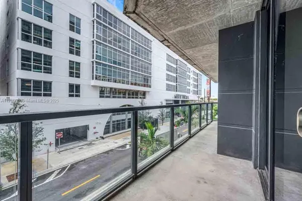 a balcony with street view and balcony