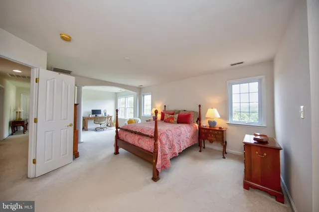 a workspace with furniture and a window