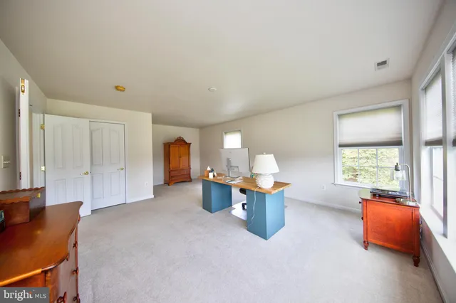 a kitchen with a stove a sink and a microwave