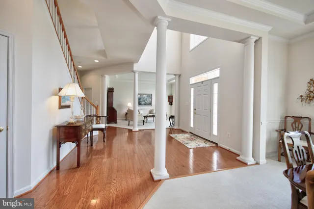 a view of a living room and dining room