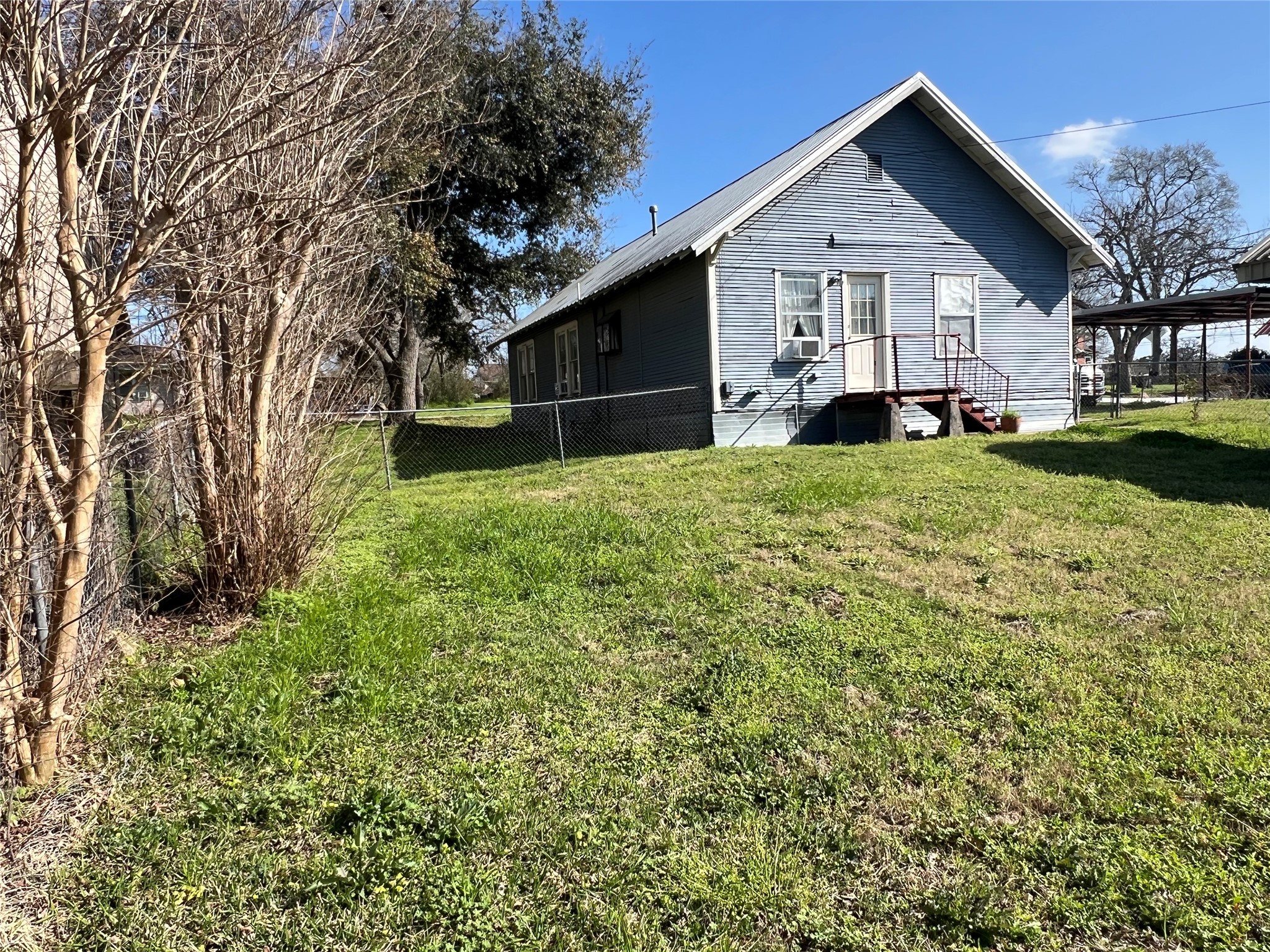 220 South Tesch Street Bellville, TX 77418 - Photo 14 of 14 a view of a yard in front of house
