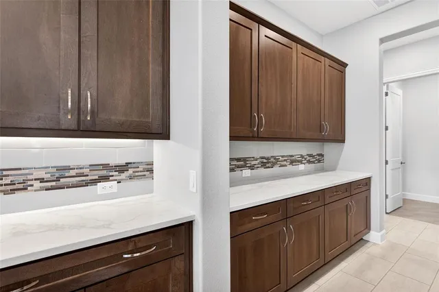a view of a kitchen with a sink