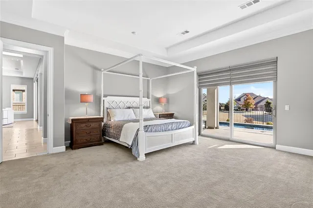 a bedroom with a bed and a walk in closet