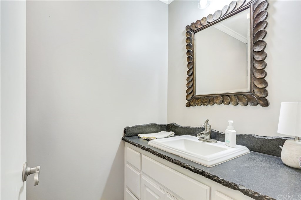 421 Gloucester Drive Costa Mesa, CA 92627 - Photo 14 of 30 Master bath with custom counters and gorgeous fixtures.