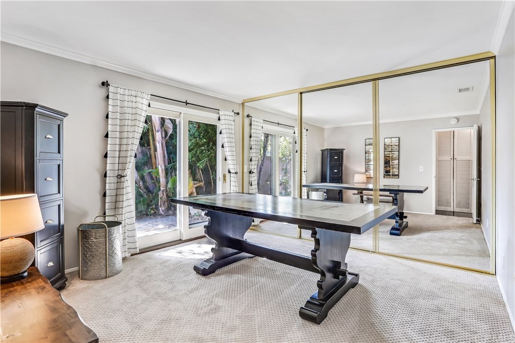 421 Gloucester Drive Costa Mesa, CA 92627 - Photo 15 of 30 Guest bedroom / office has slider to back patio and oversize closets. Fresh paint and carpet.