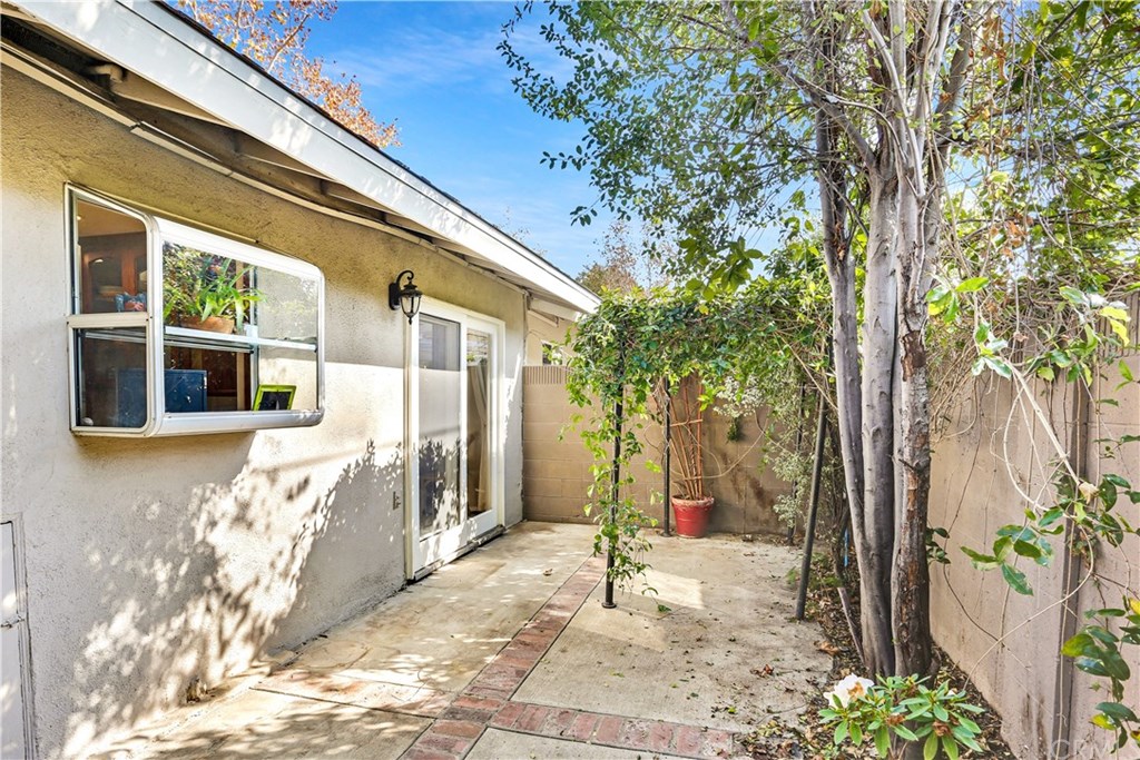 421 Gloucester Drive Costa Mesa, CA 92627 - Photo 20 of 30 Garden window from kitchen looks out to the patio.