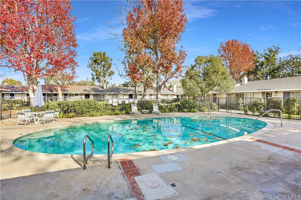 421 Gloucester Drive Costa Mesa, CA 92627 - Photo 21 of 30 HOA pool and clubhouse are right outside your front door. With only 34 neighbors there is always room to relax and enjoy the pool.