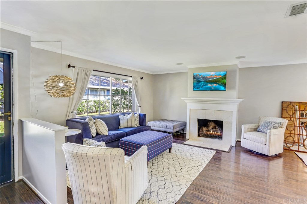 421 Gloucester Drive Costa Mesa, CA 92627 - Photo 4 of 30 Home features all new paint and fresh carpet in both bedrooms, laminate flooring, fireplace and smooth ceilings.