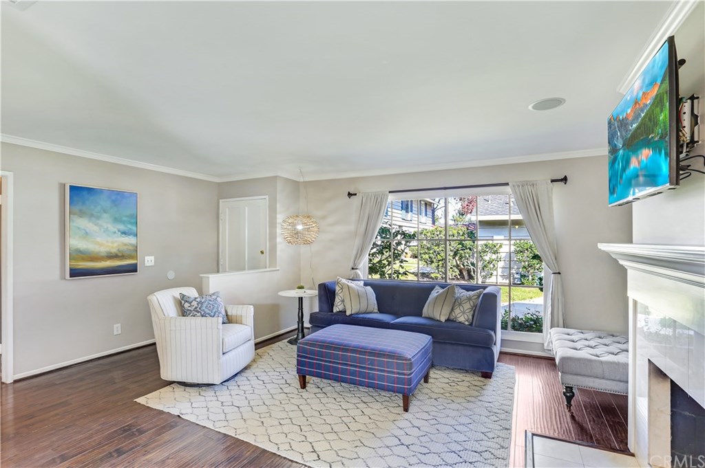 421 Gloucester Drive Costa Mesa, CA 92627 - Photo 5 of 30 Spacious living room with green views from the front window.