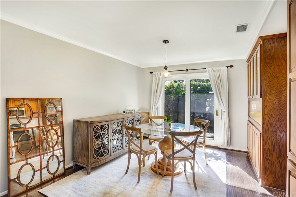 421 Gloucester Drive Costa Mesa, CA 92627 - Photo 6 of 30 Formal dining room has slider to the rear patio.