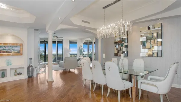 a bedroom with a large bed and a table