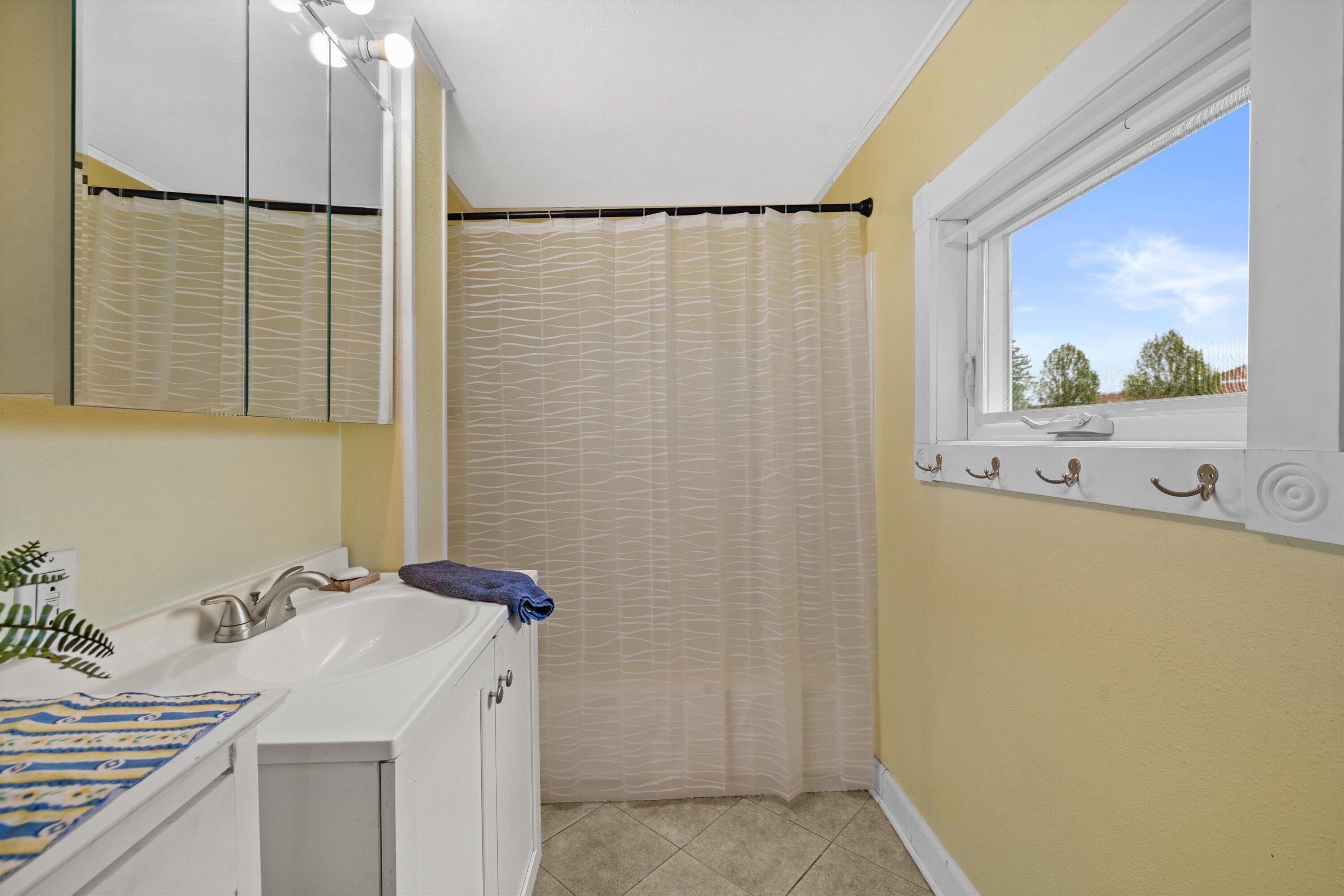220 East Walworth Street Elkhorn, WI 53121 - Photo 14 of 32 Bathroom- shower over tub