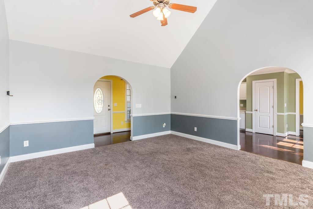 5016 Contender Drive Raleigh, NC 27603 - Photo 12 of 29 a view of a room with window and a ceiling fan