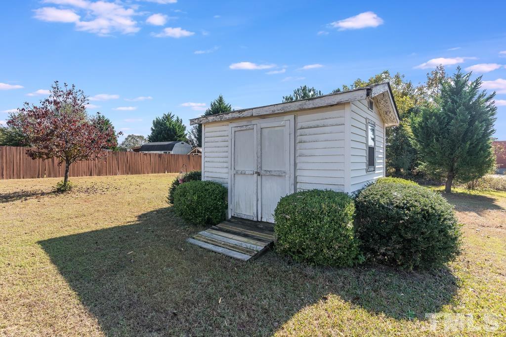 5016 Contender Drive Raleigh, NC 27603 - Photo 26 of 29 a view of a backyard