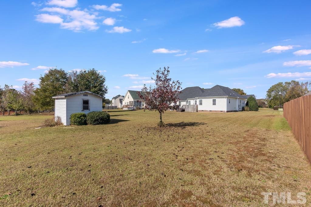 5016 Contender Drive Raleigh, NC 27603 - Photo 28 of 29 a view of a house with a yard