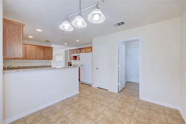 a view of a kitchen with a sink