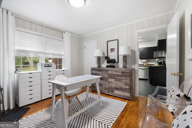 a room with furniture and a wooden floor