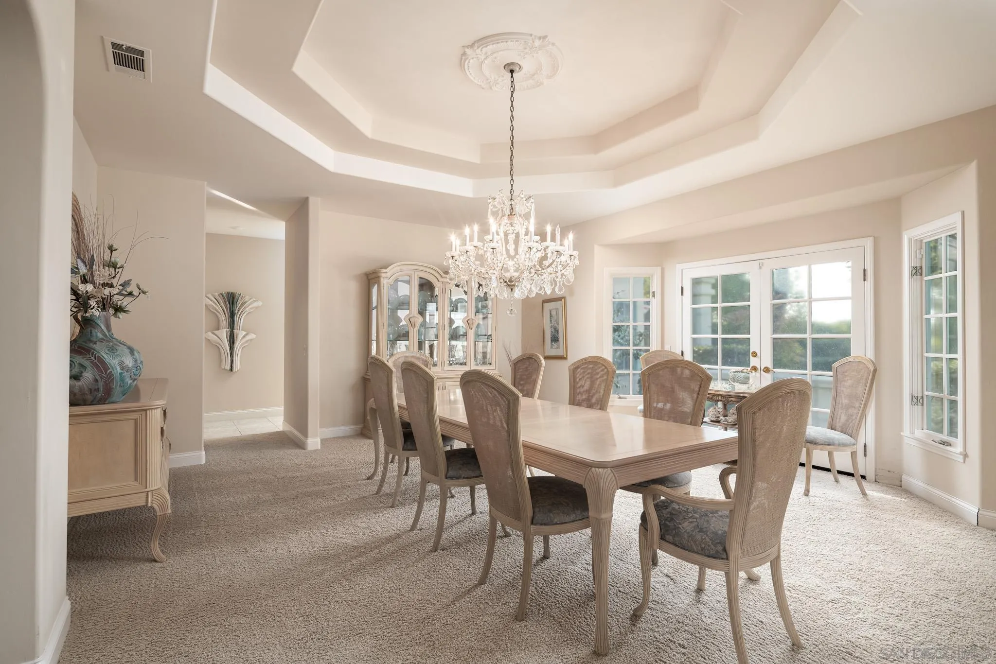 18221 Via Ascenso Rancho Santa Fe, CA 92067 - Photo 11 of 37 a view of a dining room with furniture window and outside view