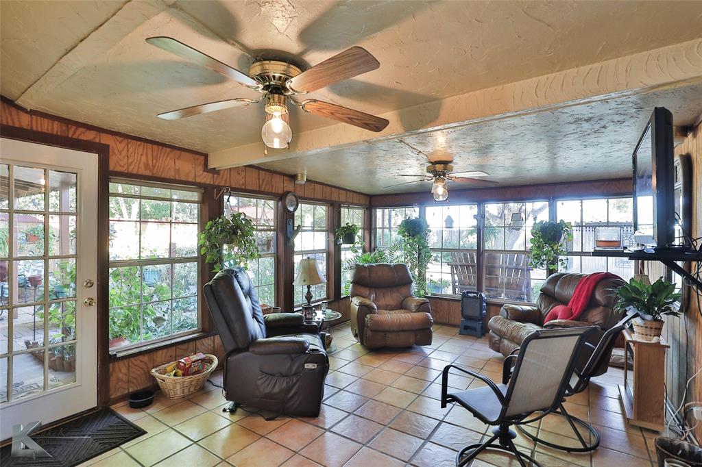 604 North 19th Street Haskell, TX 79521 - Photo 28 of 36 a living room with furniture and a large window