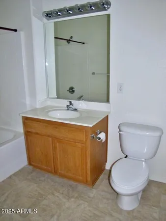 a bathroom with a shower and a bath tub