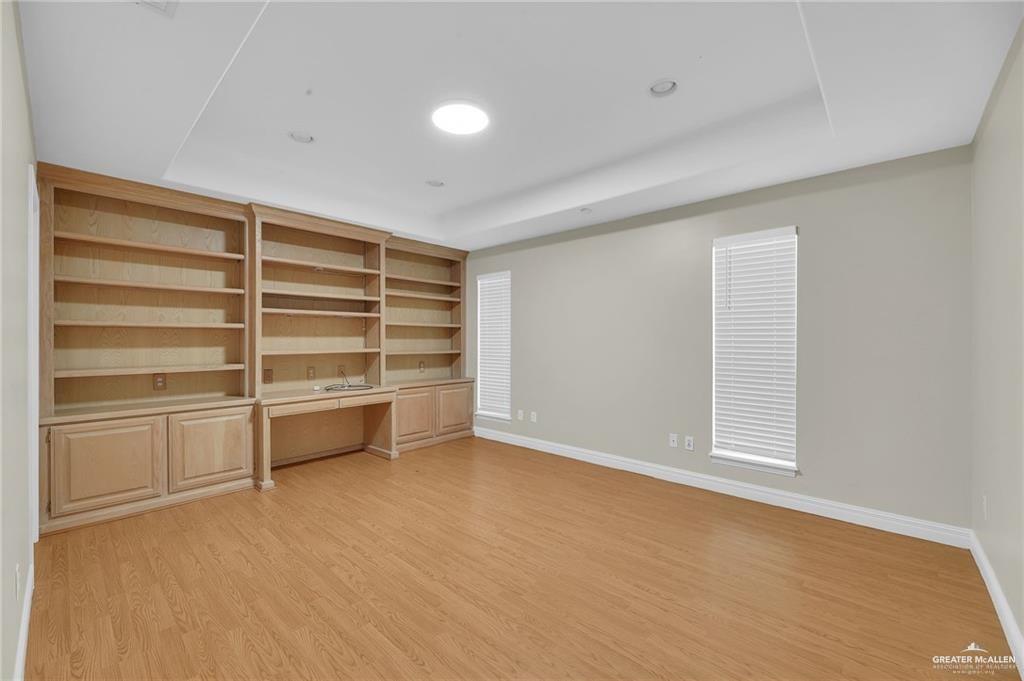 321 Condor Avenue McAllen, TX 78504 - Photo 12 of 25 a view of an empty room with a cabinet and a window