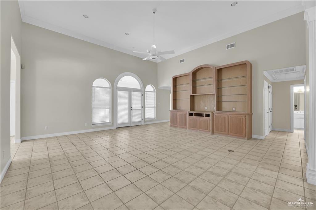 321 Condor Avenue McAllen, TX 78504 - Photo 3 of 25 a view of a big room with windows and chandelier