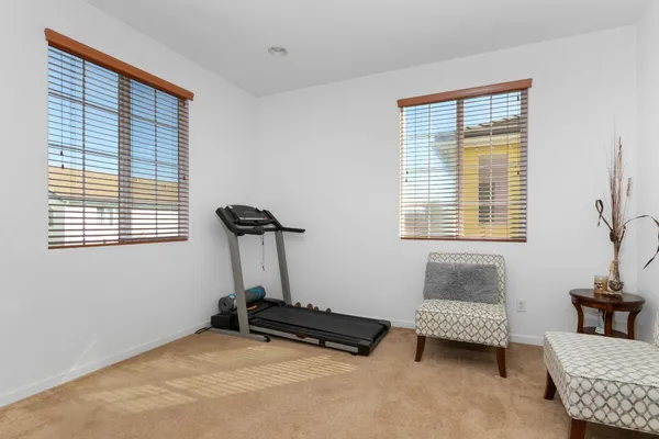 a view of a yard and palm trees