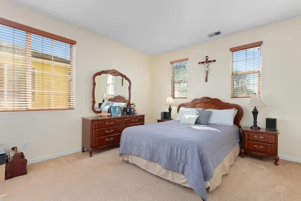 a view of a building with palm trees