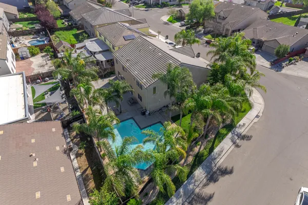 a view of a livingroom with furniture and a chandelier