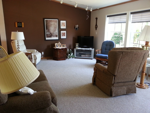 326 Maple Street Compton, IL 61318 - Photo 7 of 19 a living room with furniture and a flat screen tv