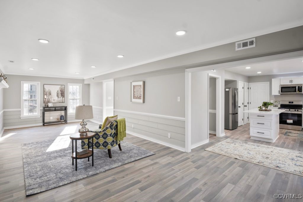 13906 2 Notch Road Midlothian, VA 23112 - Photo 12 of 39 featuring light LVP & ornamental molding