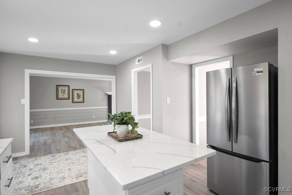 13906 2 Notch Road Midlothian, VA 23112 - Photo 17 of 39 Kitchen with Quartz countertops, light wood-type f