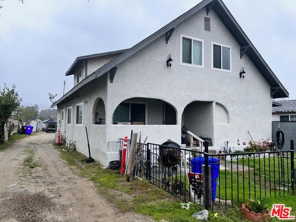 5307 El Rio Avenue Riverside, CA 92509 - Photo 1 of 20 a front view of house with yard and outdoor seating