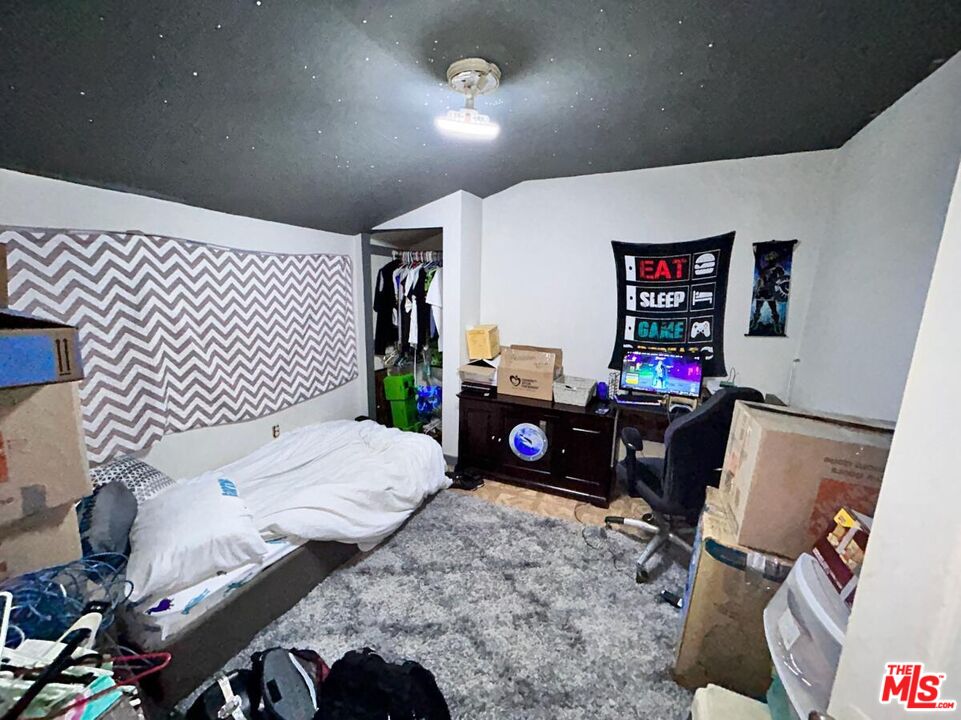 5307 El Rio Avenue Riverside, CA 92509 - Photo 12 of 20 a bedroom with bed and a tv