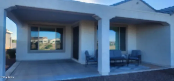 a view of livingroom with furniture and hardwood floor