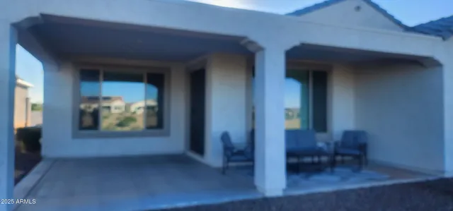 a view of livingroom with furniture and hardwood floor