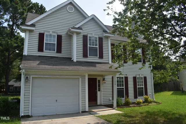 front view of a house and a yard