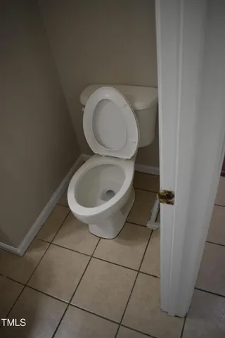 a close view of a toilet and a sink
