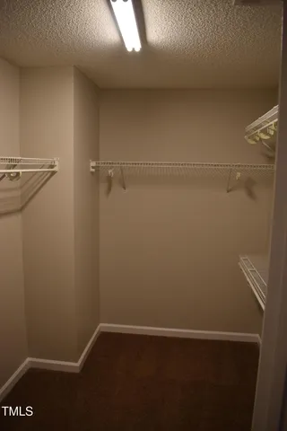 a view of small space with racks on the wall