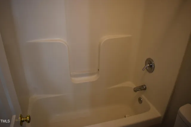 a close up of a bathtub