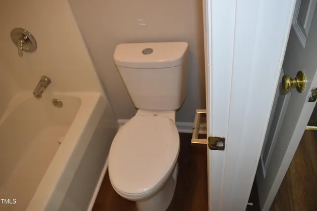 a close view of a toilet in a bathroom