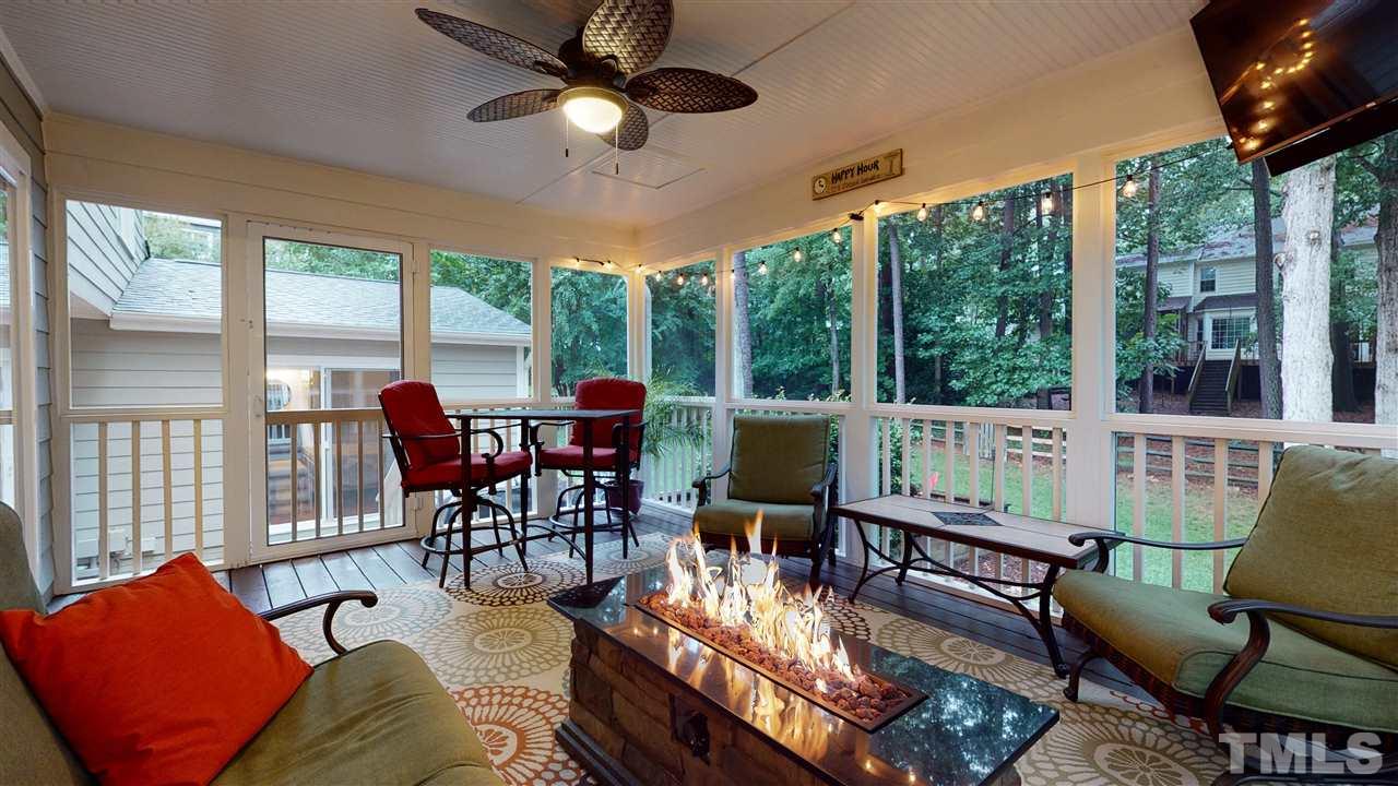 6105 Ivy Ridge Road Raleigh, NC 27612 - Photo 25 of 27 a living room with furniture and a large window