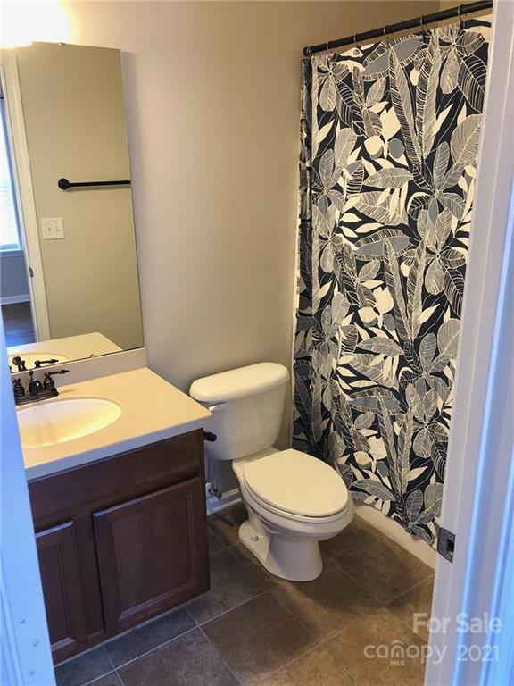 626 Raya Court Charlotte, NC 28204 - Photo 13 of 14 a bathroom with a sink toilet and shower