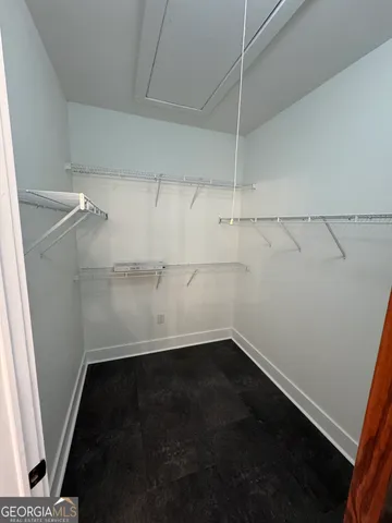 a view of a room with racks on the wall