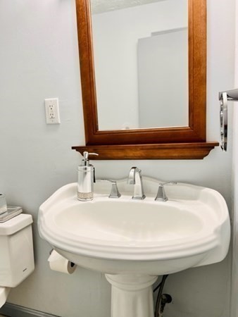 15 Spencer Road, Unit 26E Boxborough, MA 01719 - Photo 24 of 27 a bathroom with a sink and a toilet