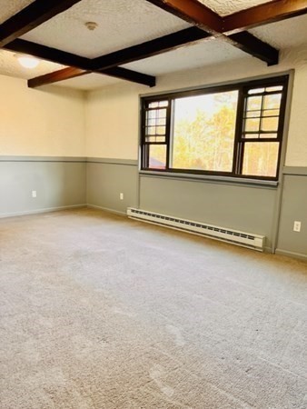 15 Spencer Road, Unit 26E Boxborough, MA 01719 - Photo 7 of 27 an empty room with windows