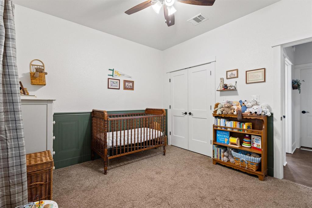 610 West Elm Street Denison, TX 75020 - Photo 17 of 26 a view of livingroom with toys
