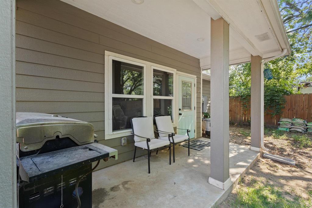 610 West Elm Street Denison, TX 75020 - Photo 21 of 26 a outdoor space with a couch and chairs